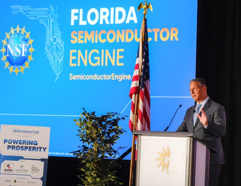 Dr. Ronald Piccolo, Interim Chief Executive Officer of the Florida Semiconductor Engine, addresses attendees at the inaugural conference.