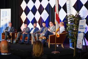 Industry leaders discuss semiconductor innovation during a panel session at Florida Semiconductor Engine event.
